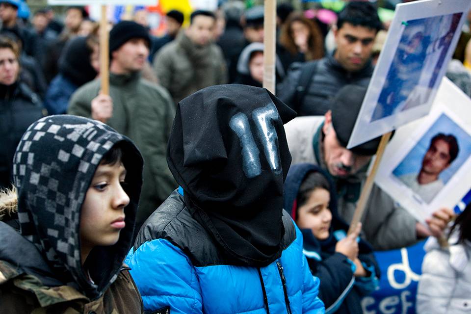 Demonstratie van Afghanen over artikel 1F